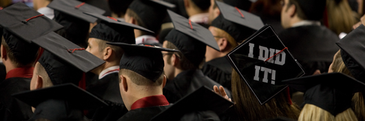 Photo of WKU students at graduation by Clinton Lewis. Photo of WKU students at graduation by Clinton Lewis.