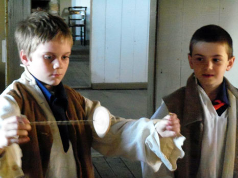 boy scout in felt house