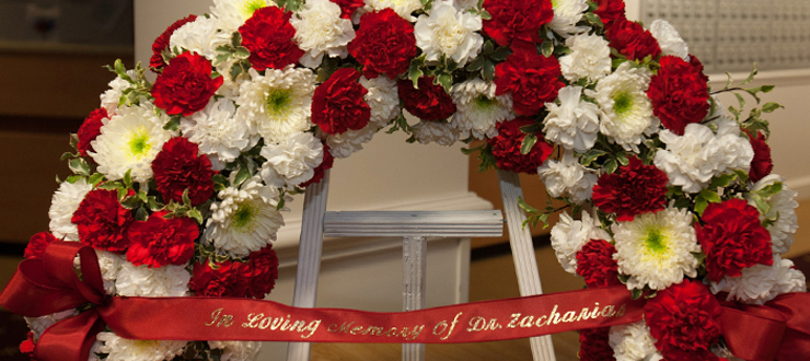 #caption2 There is a second memorial at Zacharias Hall, a residence hall named in his honor in 1997.