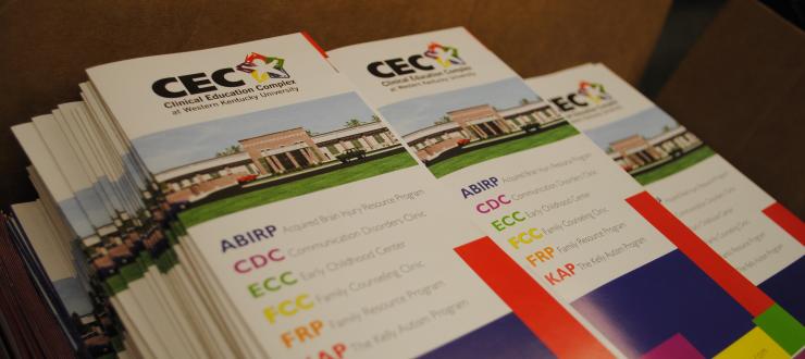stacks of Suzanne Vitale Clinical Education Complex brochures