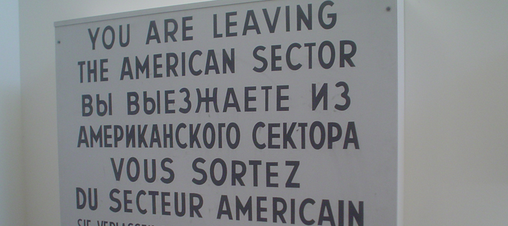#caption7 Berlin sign from Cold War with caption WKU political science offers IA major