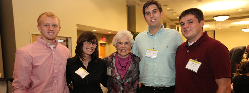 #caption7 Harriet Downing with recipients of the Dero and Harriet Downing Scholarship