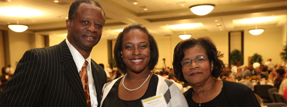 #caption2 Larnelle and Cynthia Harris pose with Brittany Carter, recipient of the Larnelle and Cynthia Harris Vocal Scholarship