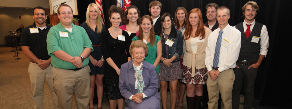 #caption3 Rosella Isbell poses with recipients of three Isbell Scholarships