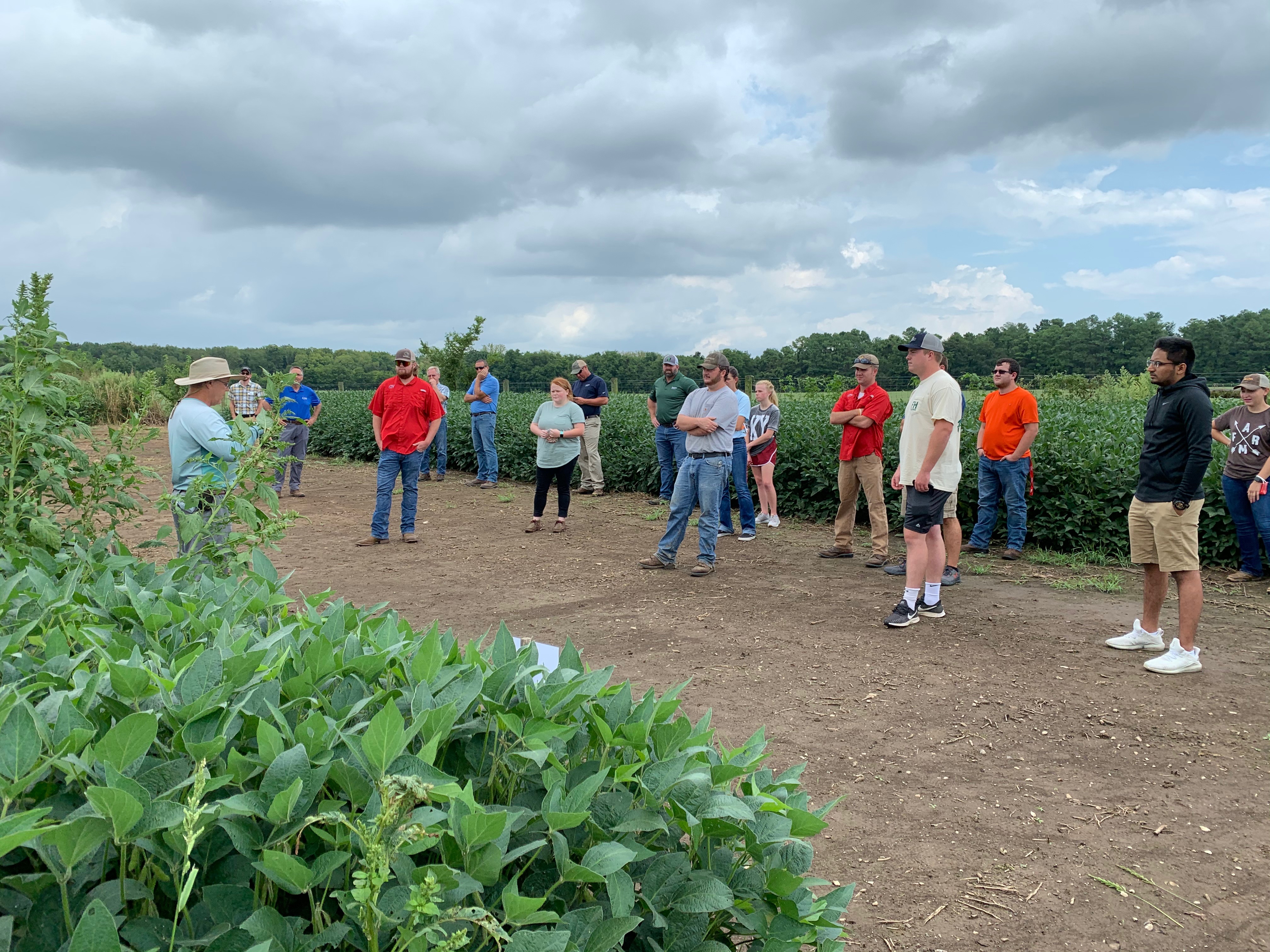 WKU Agriculture students listen to an agriculture professor speak during class at the WKU farm.