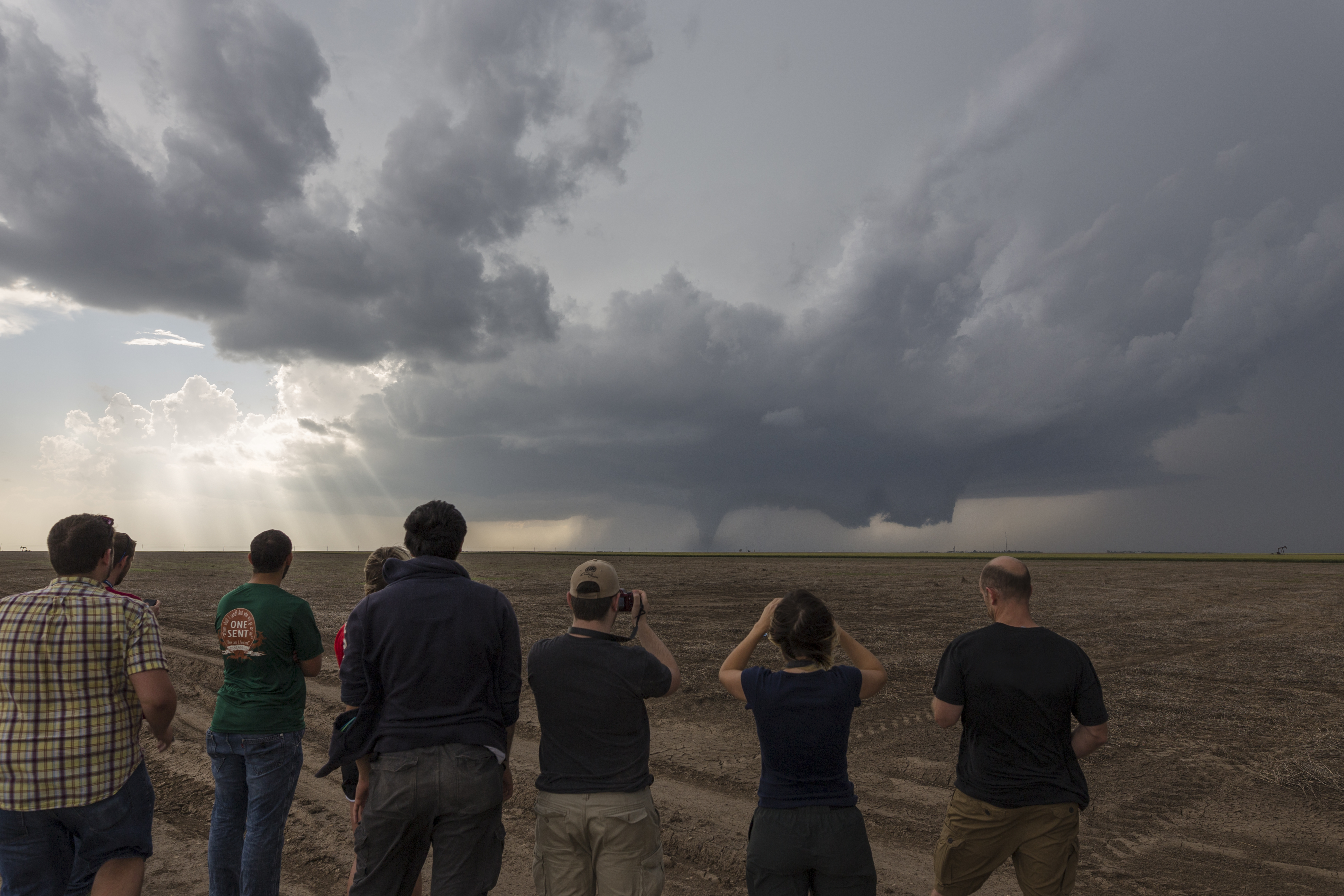 WKU students watch a tornado from a distance.