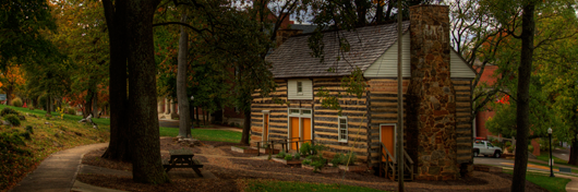 Photo of the Log House on WKU's main campus by Clinton Lewis.