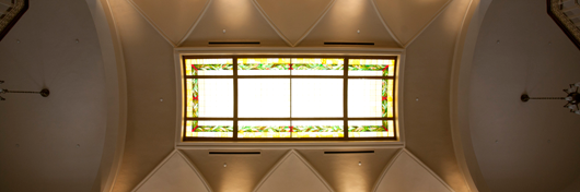 Photo of stained glass ceiling in Van Meter hall by Clinton Lewis.