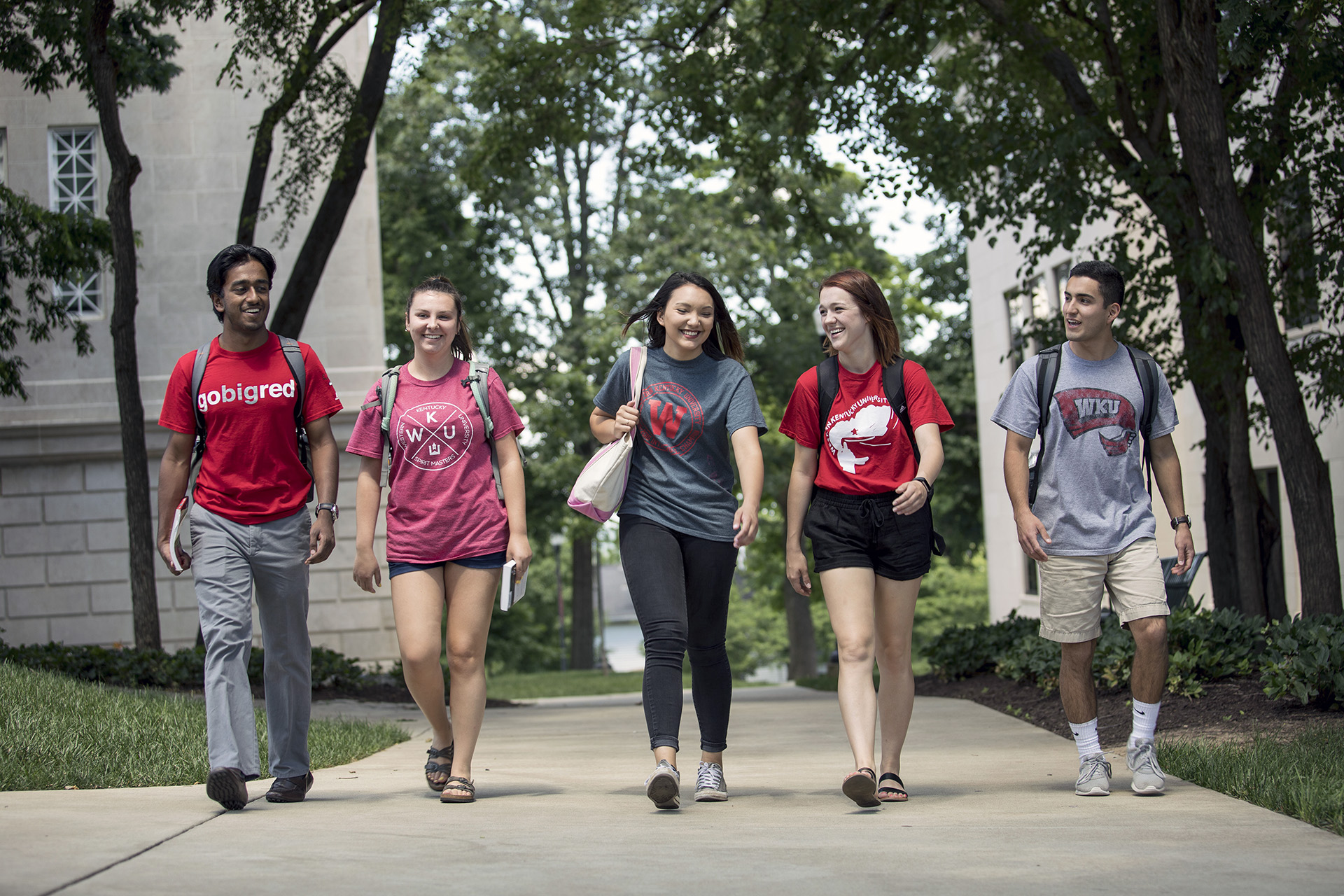 Five WKU students walking to class.