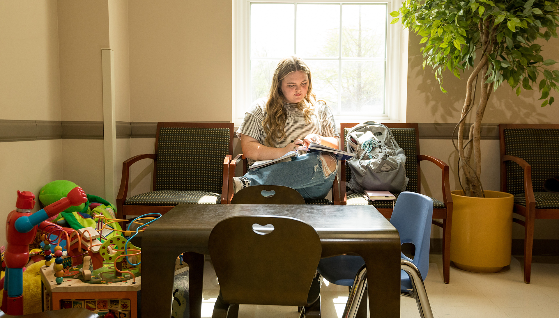 Taylor, a student in the Psychology program studying in the psychology clinic area.
