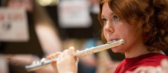 Student playing the flute at the Hilltopper Summmer Music Camp, hosted by Western Kentucky University.