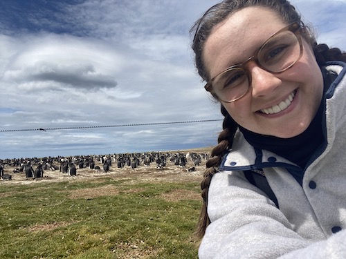 Cat Gallagher with gentoo penguins