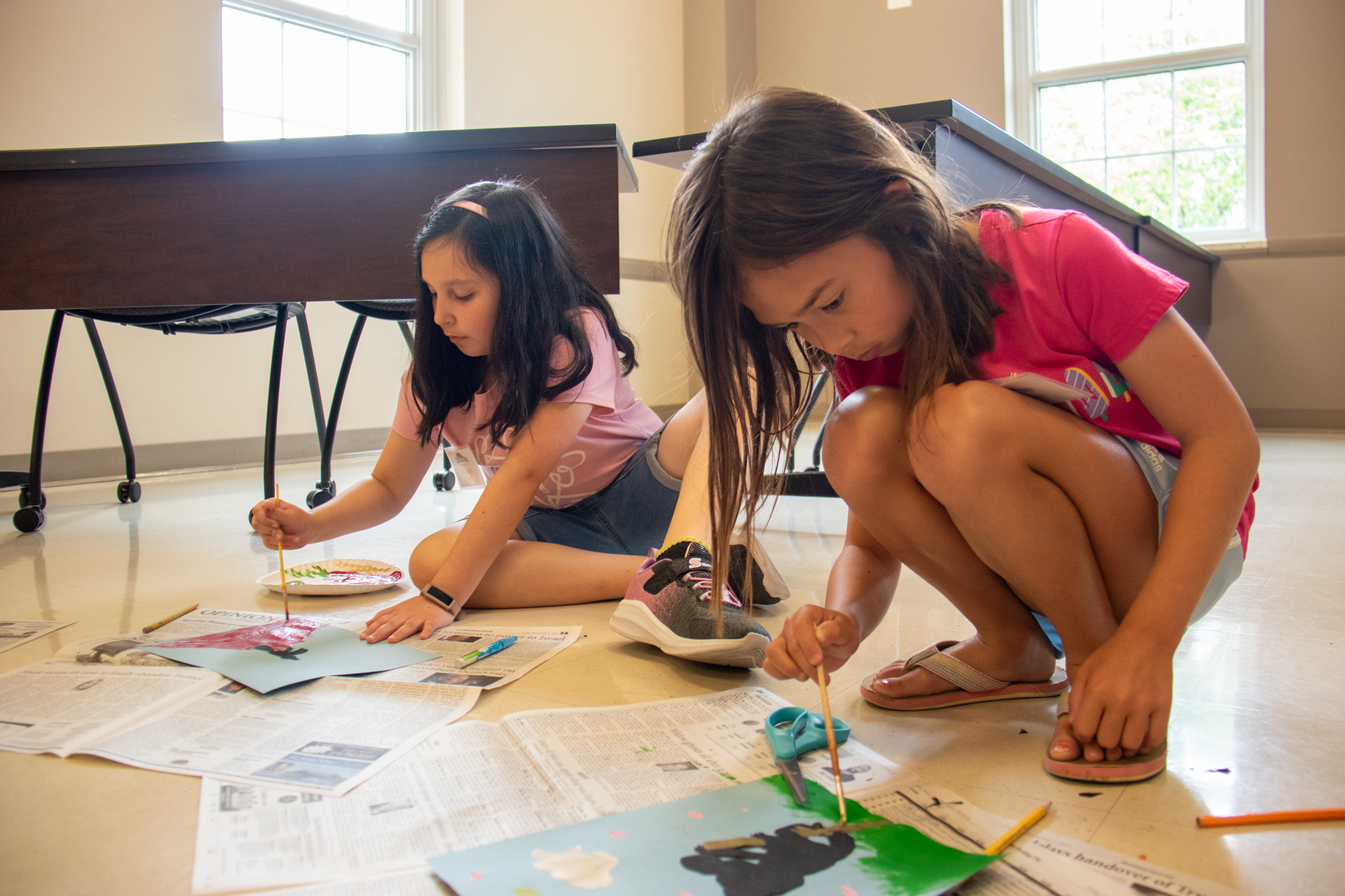 two girls painting