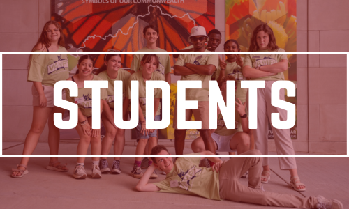 a group of students posing for a photo in matching VAMPY t-shirts