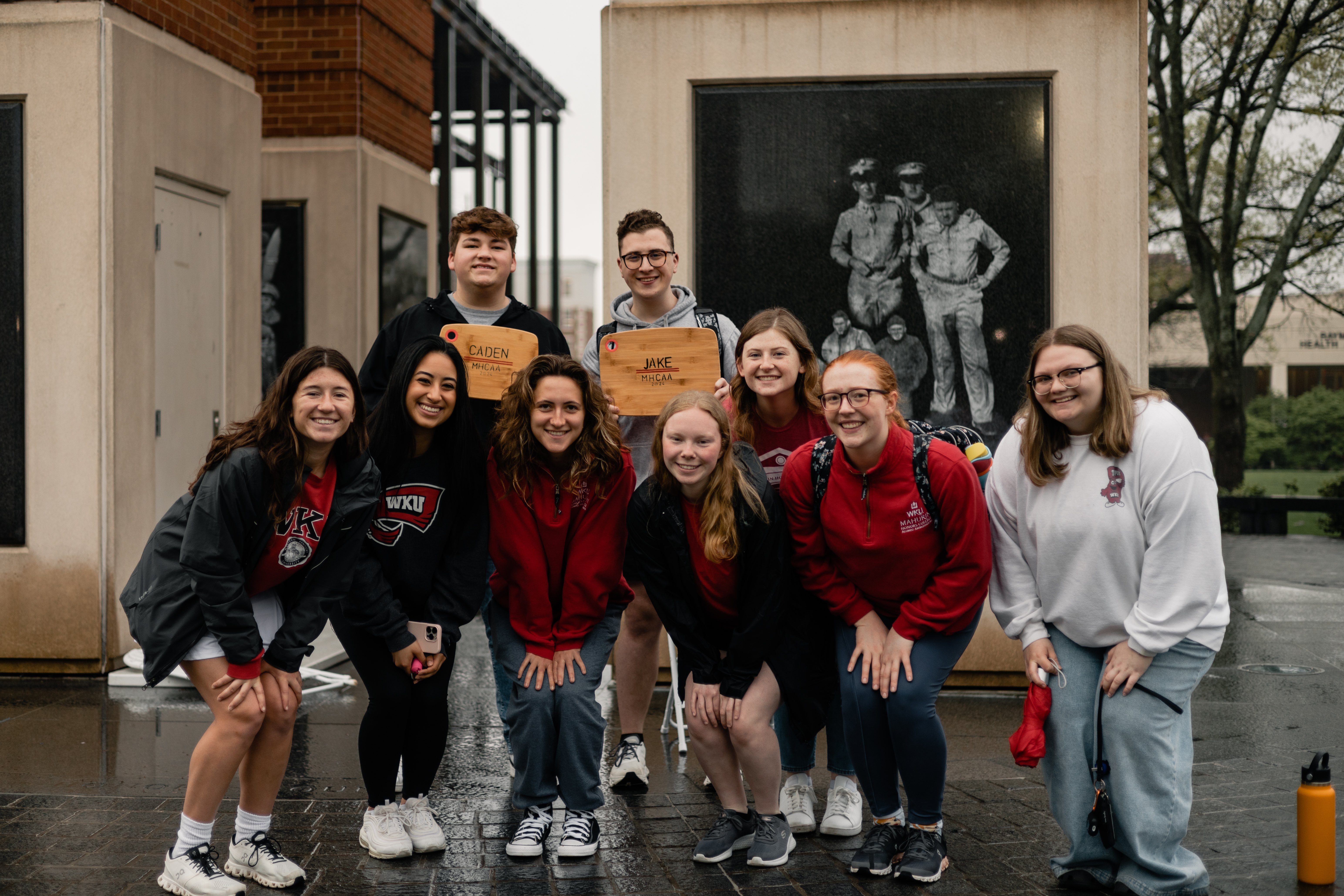 Student in front of WKU background