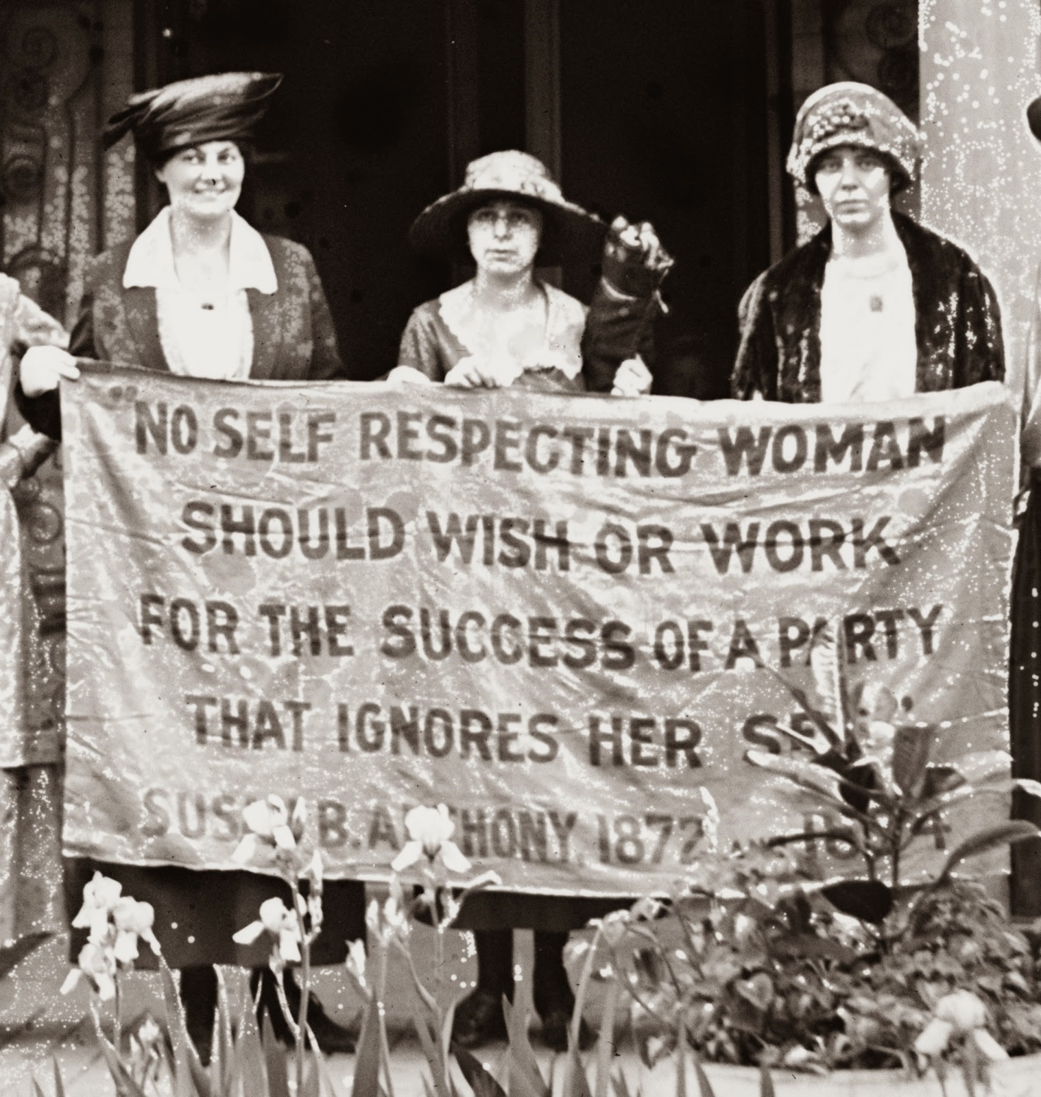 Suffragettes with banner