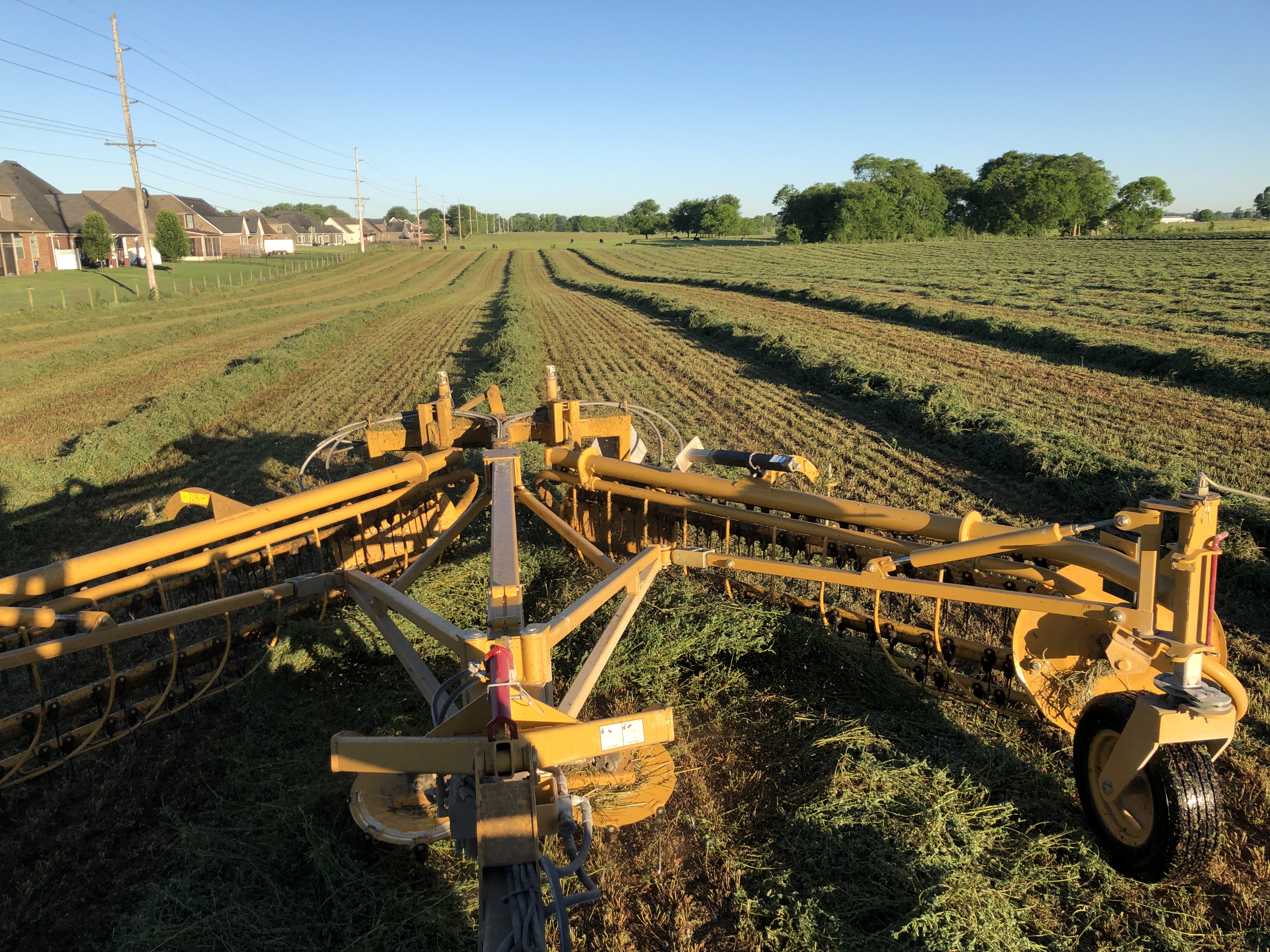 Agriculture machinery harvesting crops at the WKU farm.