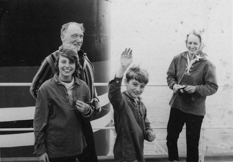 Robert Penn Warren and his wife, Eleanor Clark Warren, with their children, Rosanna Warren and Gabriel Warren, flying a kite from the front of a freighter, 1966. 