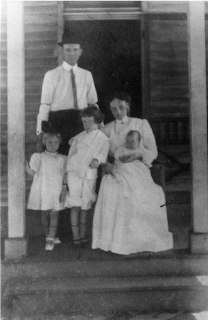 The Warren family on their front porch in Guthrie, Kentucky, 1910. Robert Penn Warren is pictured with his mother, Anna Ruth Penn, his father, Robert Franklin Warren, his sister, Mary Cecilia, and his brother, William Thomas Warren.