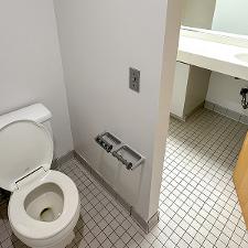 Toilet room with privacy door