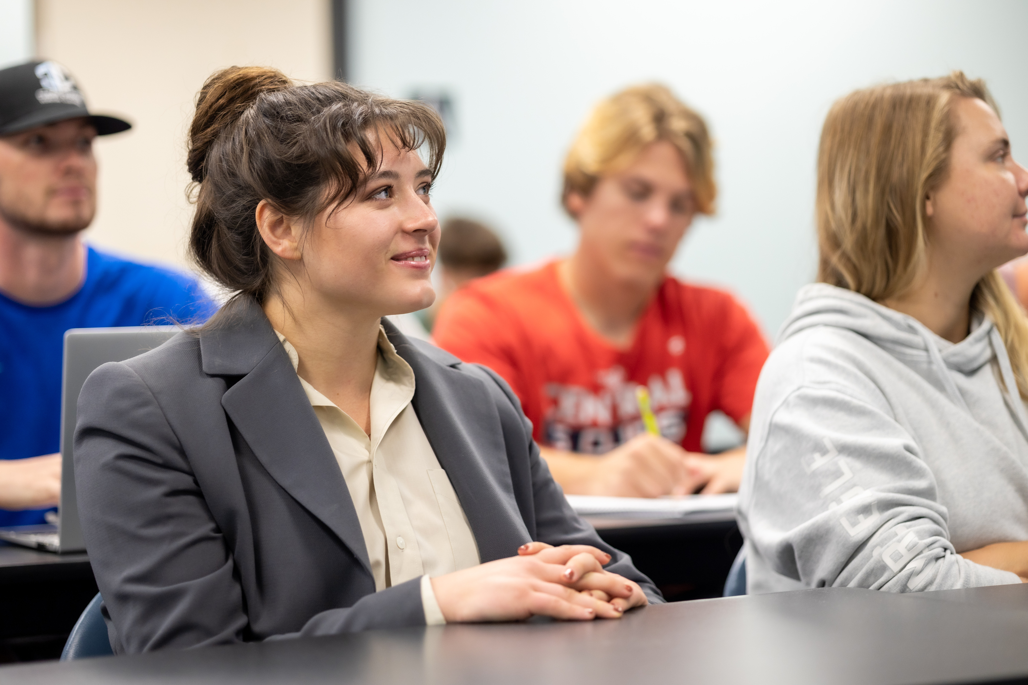 A WKU student sits in class.