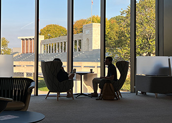 students in the commons overlooking the colonnades