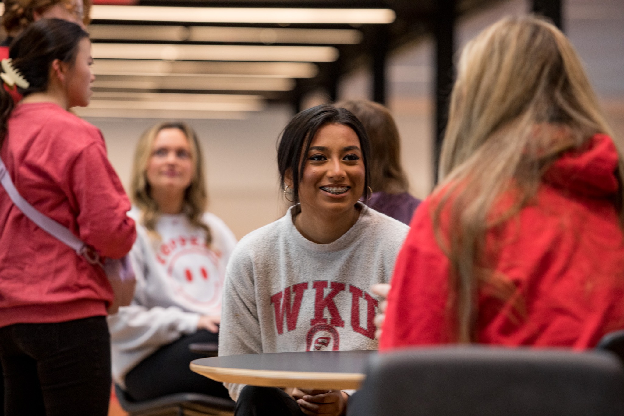 Students talking at a table